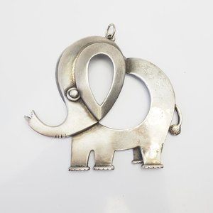 Cute large vintage silver tone metal elephant animal pendant